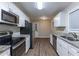 Eat-in kitchen with stainless steel appliances and granite countertops at 2761 Whisper Ct, Douglasville, GA 30135