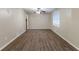 Spacious living room with wood-look flooring and ceiling fan at 2761 Whisper Ct, Douglasville, GA 30135