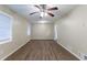 Bright living room with neutral walls and ceiling fan at 2761 Whisper Ct, Douglasville, GA 30135