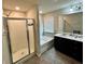 Spacious bathroom with shower, soaking tub, and dual vanity at 1323 Rosemary Ln, Atlanta, GA 30344