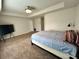 Spacious main bedroom with carpeted flooring and large bed at 1323 Rosemary Ln, Atlanta, GA 30344