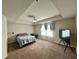 Spacious bedroom with carpet, ceiling fan, and natural light at 1323 Rosemary Ln, Atlanta, GA 30344