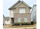 Charming two-story home with brick and siding exterior at 1323 Rosemary Ln, Atlanta, GA 30344