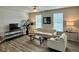 Living room with comfy white sofa and modern decor at 1323 Rosemary Ln, Atlanta, GA 30344