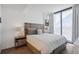Spacious main bedroom with large window and city view at 788 W Marietta Nw St # 403, Atlanta, GA 30318