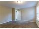 Spacious bedroom with plush carpeting and open doorways at 2755 Sherlock Dr, Decatur, GA 30034