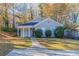 Charming single-story home with a covered front porch and landscaped yard at 2755 Sherlock Dr, Decatur, GA 30034