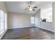 Spacious living room with vaulted ceilings, a ceiling fan, and ample natural light at 2755 Sherlock Dr, Decatur, GA 30034