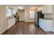 Kitchen with white cabinets, granite counters, and stainless steel appliances at 2126 River Rd, Ellenwood, GA 30294
