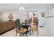 Breakfast nook with tile floors and a glass-top table at 1142 Preserve Park Dr, Loganville, GA 30052