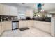 Kitchen with stainless steel appliances and granite countertops at 1142 Preserve Park Dr, Loganville, GA 30052