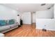 Bright loft area with hardwood floors and neutral walls at 1142 Preserve Park Dr, Loganville, GA 30052