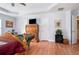 Main bedroom with wood floors and ample closet space at 1142 Preserve Park Dr, Loganville, GA 30052