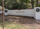 Community entrance sign for Santolinia Park with wreaths at 405 Baneberry Bnd, Peachtree City, GA 30269