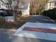 Long paved driveway leading to a house at 405 Baneberry Bnd, Peachtree City, GA 30269