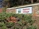 Stone entrance sign for Kedron Village community at 405 Baneberry Bnd, Peachtree City, GA 30269