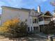 Back of house showing a deck and screened porch at 405 Baneberry Bnd, Peachtree City, GA 30269