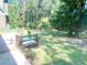 Spacious backyard with patio and wooded area at 5940 Old Bill Cook Rd, Atlanta, GA 30349