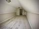Large bonus room with wall paneling and carpet flooring at 5940 Old Bill Cook Rd, Atlanta, GA 30349