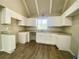 Renovated kitchen, granite counters, white cabinets at 5940 Old Bill Cook Rd, Atlanta, GA 30349