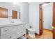 Clean bathroom with white vanity and new toilet at 1762 Hunting Creek Se Ln, Conyers, GA 30013