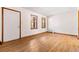 Simple living room with hardwood floors and neutral walls at 1762 Hunting Creek Se Ln, Conyers, GA 30013