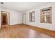 Spacious living room with hardwood floors and hallway view at 1762 Hunting Creek Se Ln, Conyers, GA 30013