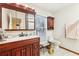 Bathroom with wood vanity, toilet, and towel warmer at 41 Plantation Ne Dr # A, Atlanta, GA 30324