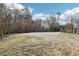 Green community space with trees and walking path at 41 Plantation Ne Dr # A, Atlanta, GA 30324