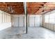 Two-car garage with overhead storage and windows for natural light at 1151 Martin Rd, Stone Mountain, GA 30088
