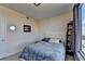 Cozy bedroom with a large window and city views at 3338 Ne Peachtree Ne Rd # 1102, Atlanta, GA 30326