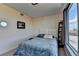 Cozy bedroom with large windows showcasing stunning city views at 3338 Ne Peachtree Ne Rd # 1102, Atlanta, GA 30326