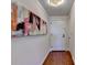 Entryway with hardwood floors and large artwork at 3338 Ne Peachtree Ne Rd # 1102, Atlanta, GA 30326