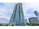 High-rise building exterior showcasing glass facade and balconies at 3338 Ne Peachtree Ne Rd # 1102, Atlanta, GA 30326