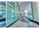 Curved hallway with floor-to-ceiling windows and contemporary design at 3338 Ne Peachtree Ne Rd # 1102, Atlanta, GA 30326