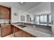 Modern kitchen with stainless steel appliances and granite countertops at 3338 Ne Peachtree Ne Rd # 1102, Atlanta, GA 30326