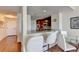 Open-concept kitchen with breakfast bar and hardwood floors at 3338 Ne Peachtree Ne Rd # 1102, Atlanta, GA 30326