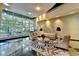 Building lobby with comfortable seating, large windows, and stylish decor at 3338 Ne Peachtree Ne Rd # 1102, Atlanta, GA 30326