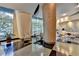 Elegant lobby area with plush seating, large windows, and decorative columns at 3338 Ne Peachtree Ne Rd # 1102, Atlanta, GA 30326