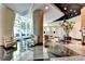 Open and inviting lobby with modern furniture, sleek finishes, and abundant natural light at 3338 Ne Peachtree Ne Rd # 1102, Atlanta, GA 30326