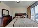 Spacious Primary bedroom with large windows offering scenic city views at 3338 Ne Peachtree Ne Rd # 1102, Atlanta, GA 30326
