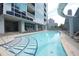 Inviting pool with modern design, multiple entry points, and plenty of deck space at 3338 Ne Peachtree Ne Rd # 1102, Atlanta, GA 30326