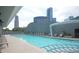 Relaxing pool area with ample lounge seating, city views, and a unique slide at 3338 Ne Peachtree Ne Rd # 1102, Atlanta, GA 30326