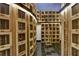 Large wine cellar with wooden storage lockers and a rolling ladder at 3338 Ne Peachtree Ne Rd # 1102, Atlanta, GA 30326