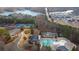 Aerial view of community amenities including pool, tennis courts, and clubhouse at 102 Twilight Overlook, Canton, GA 30114