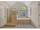 Bathroom boasts a soaking tub and walk-in shower at 102 Twilight Overlook, Canton, GA 30114