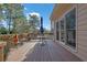 Deck with table, umbrella, and access to home's interior at 102 Twilight Overlook, Canton, GA 30114