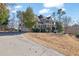 Two-story house with brick accents and a large front porch at 102 Twilight Overlook, Canton, GA 30114