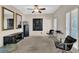 Game room with dartboard, entertainment center, and comfortable seating at 102 Twilight Overlook, Canton, GA 30114