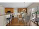 Kitchen with wooden cabinets, breakfast nook and hardwood floors at 102 Twilight Overlook, Canton, GA 30114